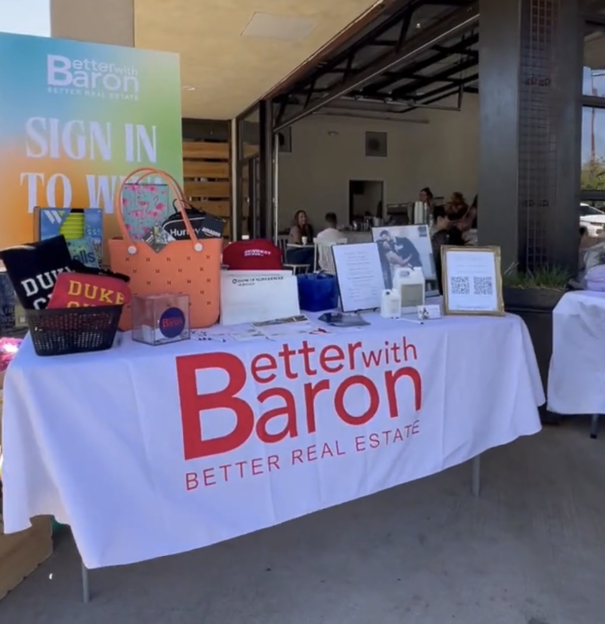 Better with Baron branded table set up outside a local Albuquerque coffee shop