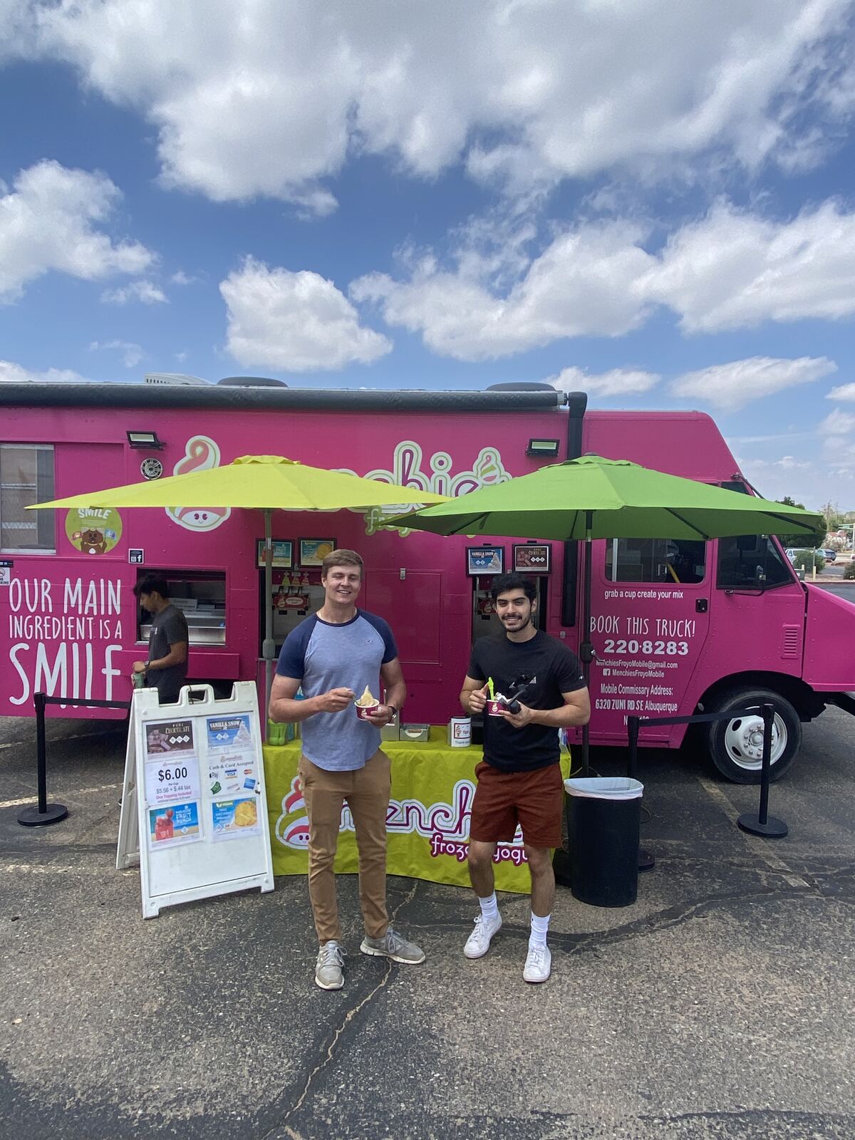 Guests enjoying frozen yogurt from the Menchie's food truck at a Better with Baron client appreciation event in Albuquerque, New Mexico