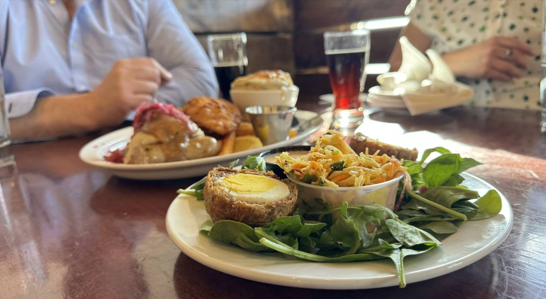 St. Patrick’s Day in Albuquerque: Local Events, Pubs, and Fun. Two delicious Irisih dishes and dark beers enjoyed by the Better with Baron team at Quarter Celtic irish pub.