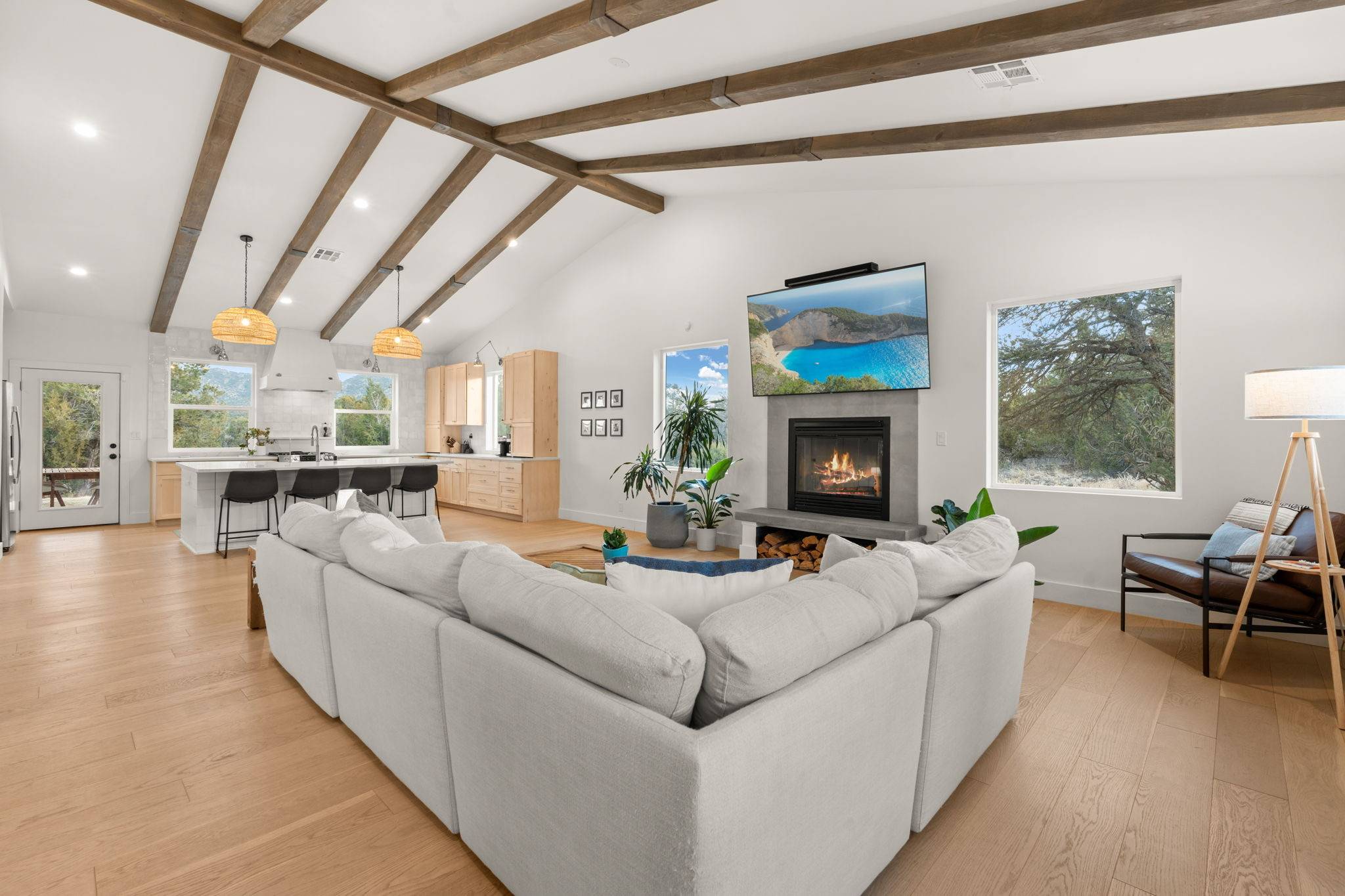 A lovely open floor plan with a living room and kitchen wth high ceiling beams. Listed by Better with Baron team of Albuquerque, NM. Albuquerque home selling process