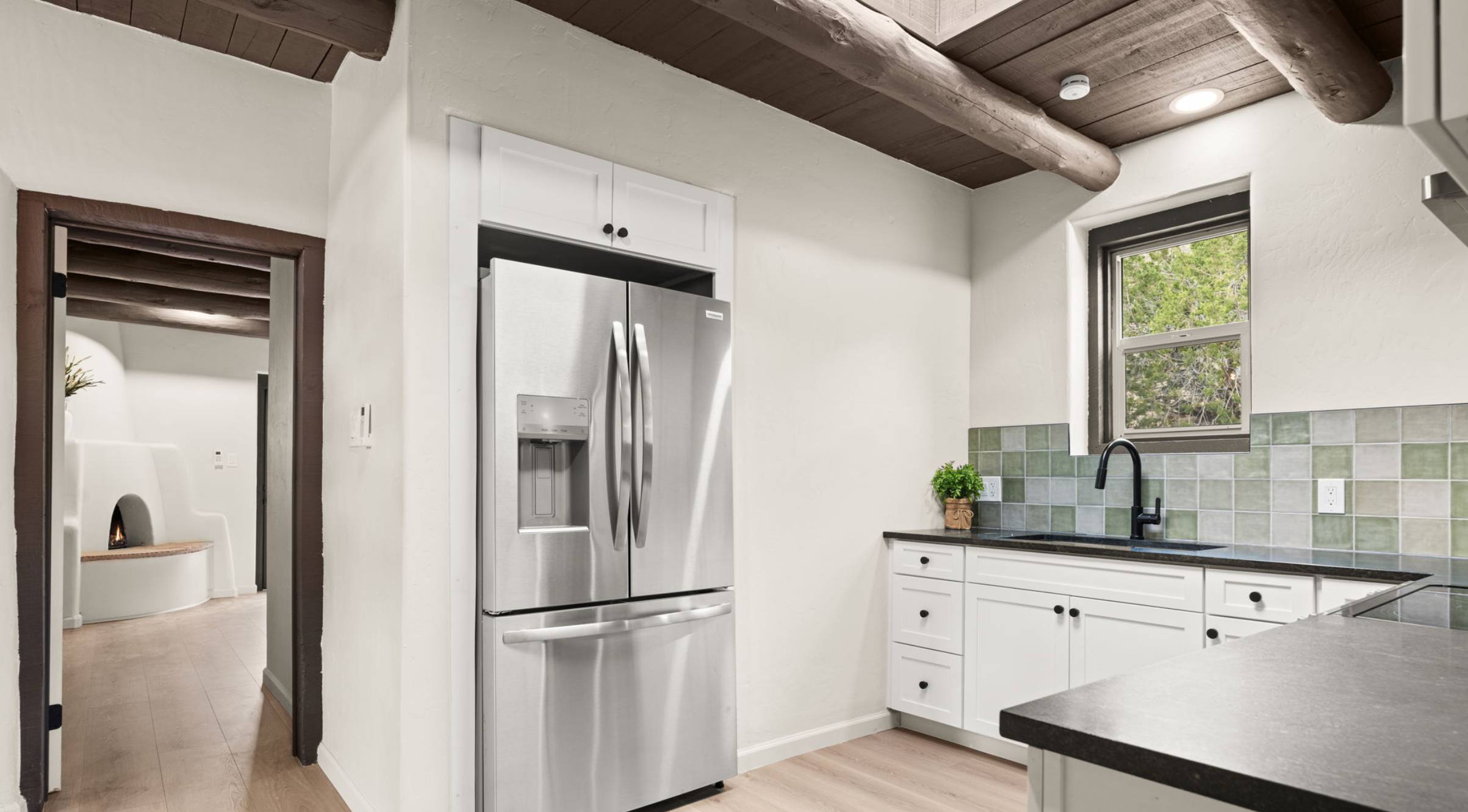 Beautiful redone southwestern kitchen. 77 Aspen Lane listed by the Better with Baron Team. How much money do I need to buy a house in Albuquerque