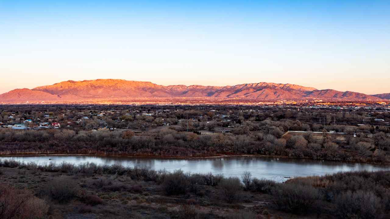 Sandia Mountains and Rio Grande river at dusk. Albuquerque's Westside. 